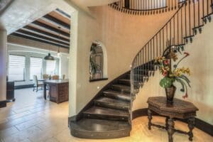 Stylish staircase beside dining area